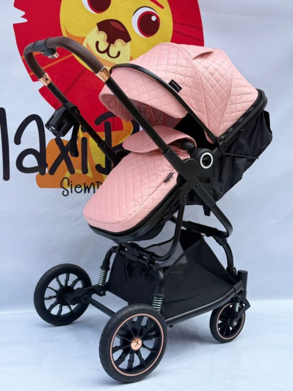Coche Moises cierra como coche Maleta color rosado  Maxibaby